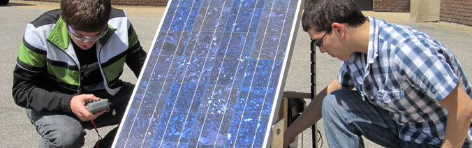 Students testing solar panel
