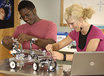 male and female student working together