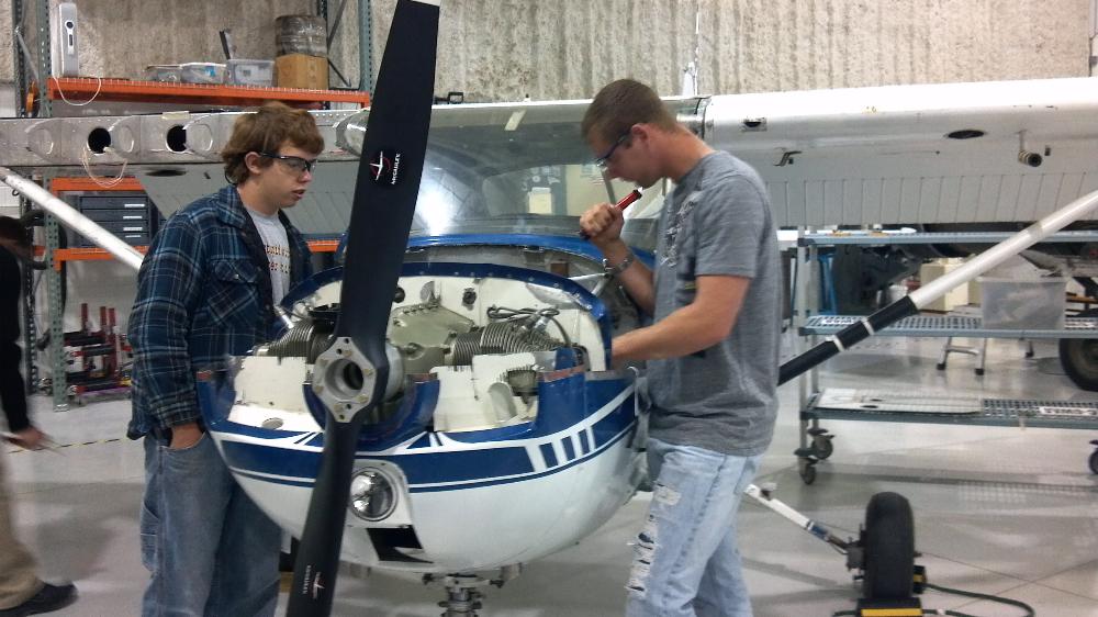 Alternative Energy students conducting an inspection with Aviation Maintenance students.