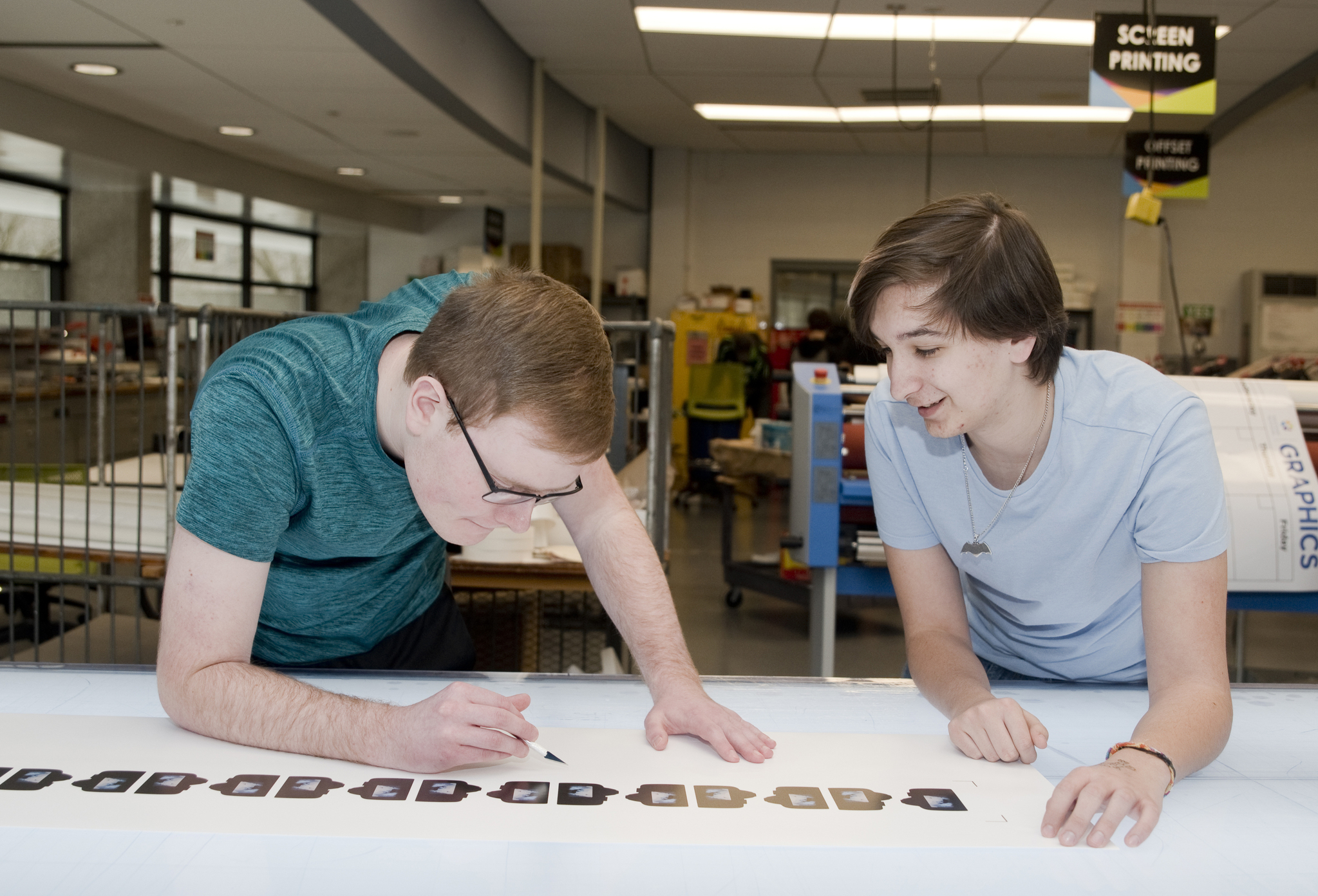 Students "weeding" decals